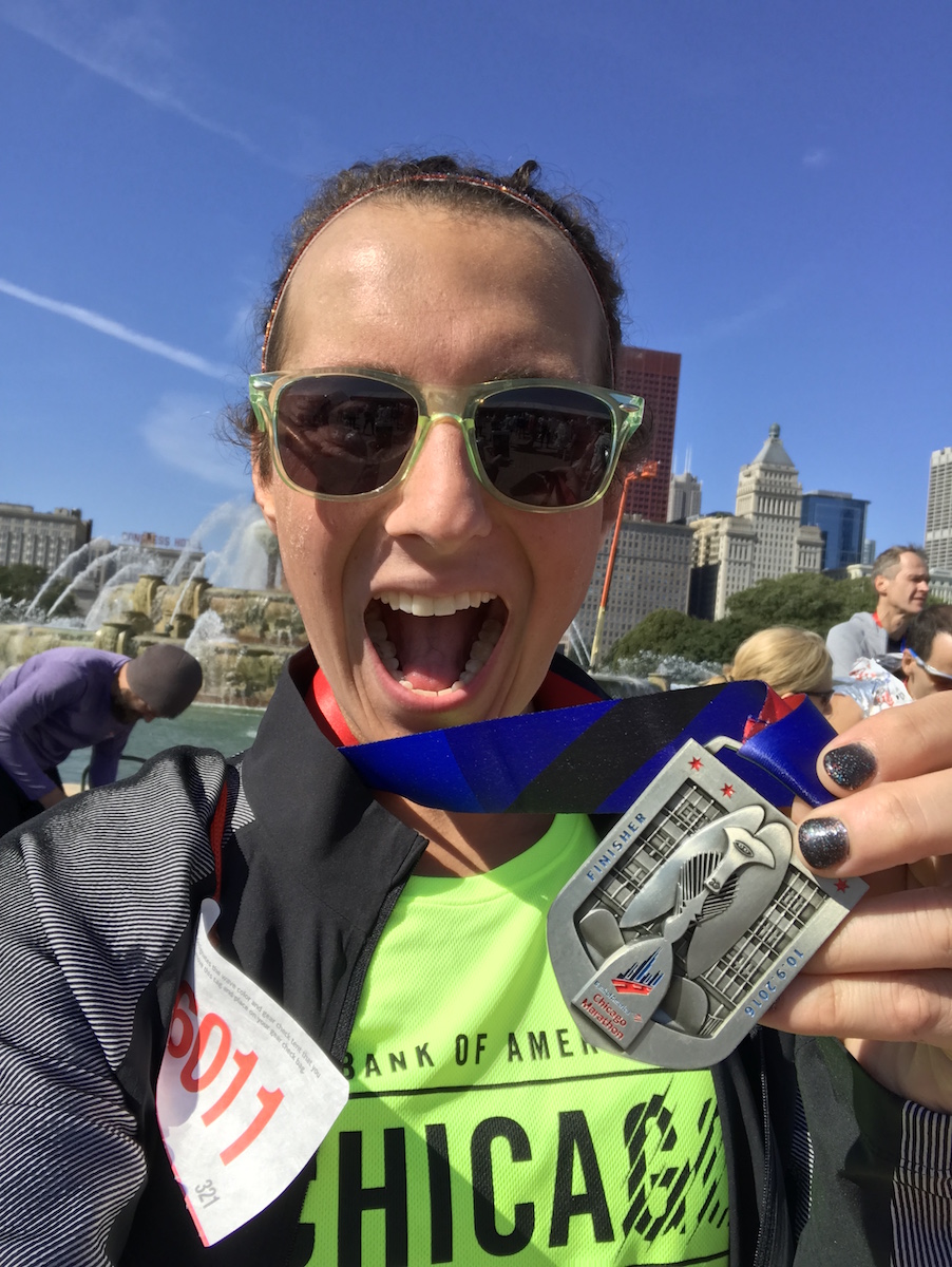 Amelia Gapin with 2016 Chicago Marathon medal in Grant Park