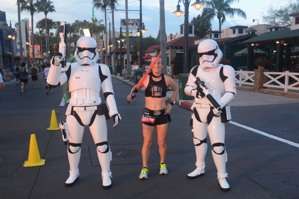 Amelia with stormtroopers at runDisney Star Wars Dark Side Half Marathon