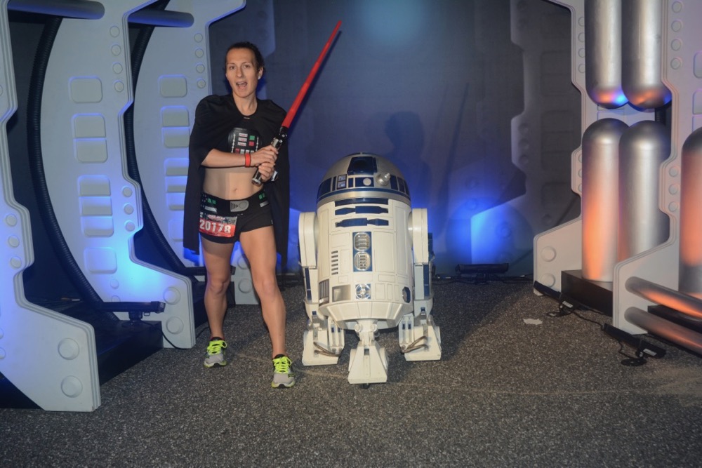 Amelia with R2D2 at runDisney Star Wars Dark Side Half Marathon