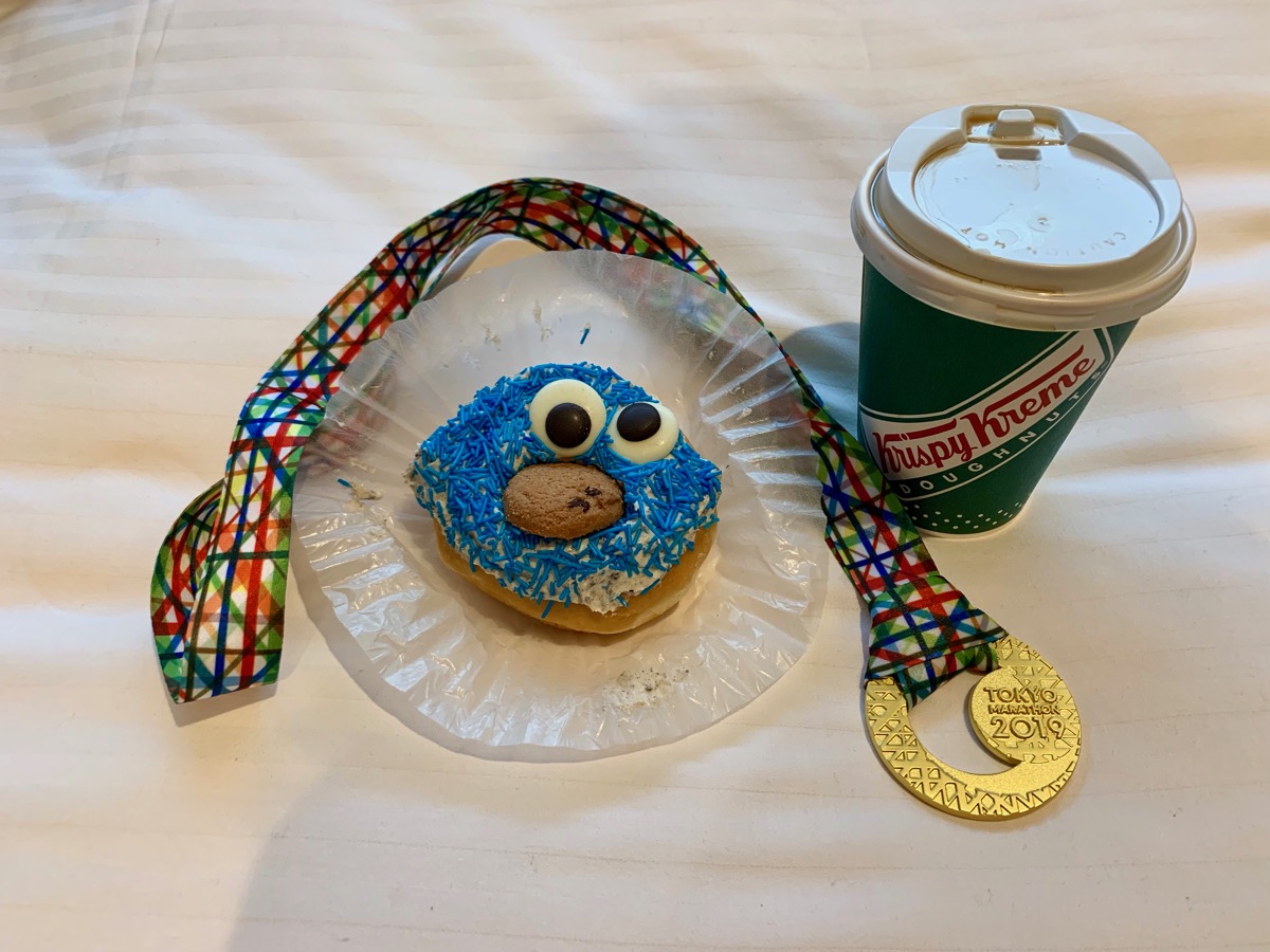 Race medal and Krispy Kreme